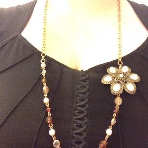 Vintage-style beaded necklace with flower pendant